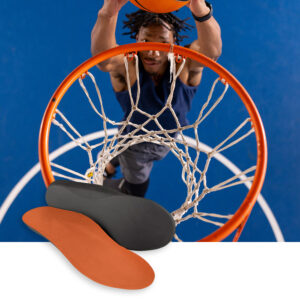 Basketball player dunking, with orthotics